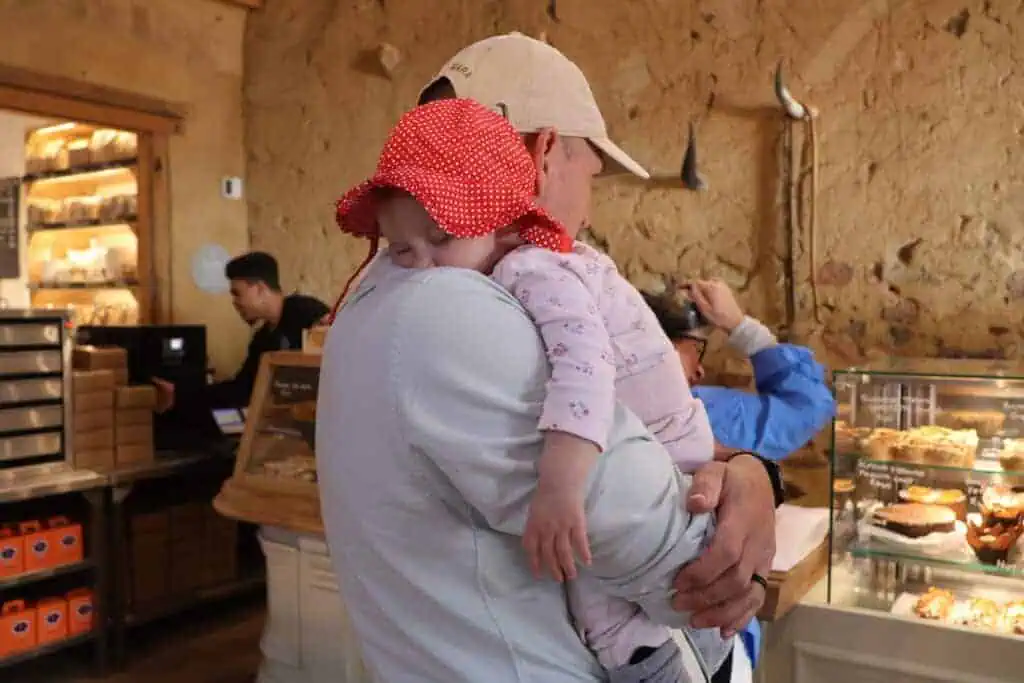 Baby asleep on dad
